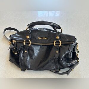 Miu Miu Black Leather Satchel with Gold Accents